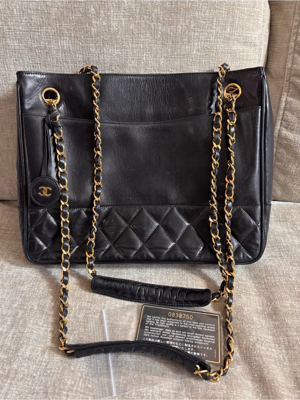 Authentic CHANEL black lambskin vintage charm shoulder bag